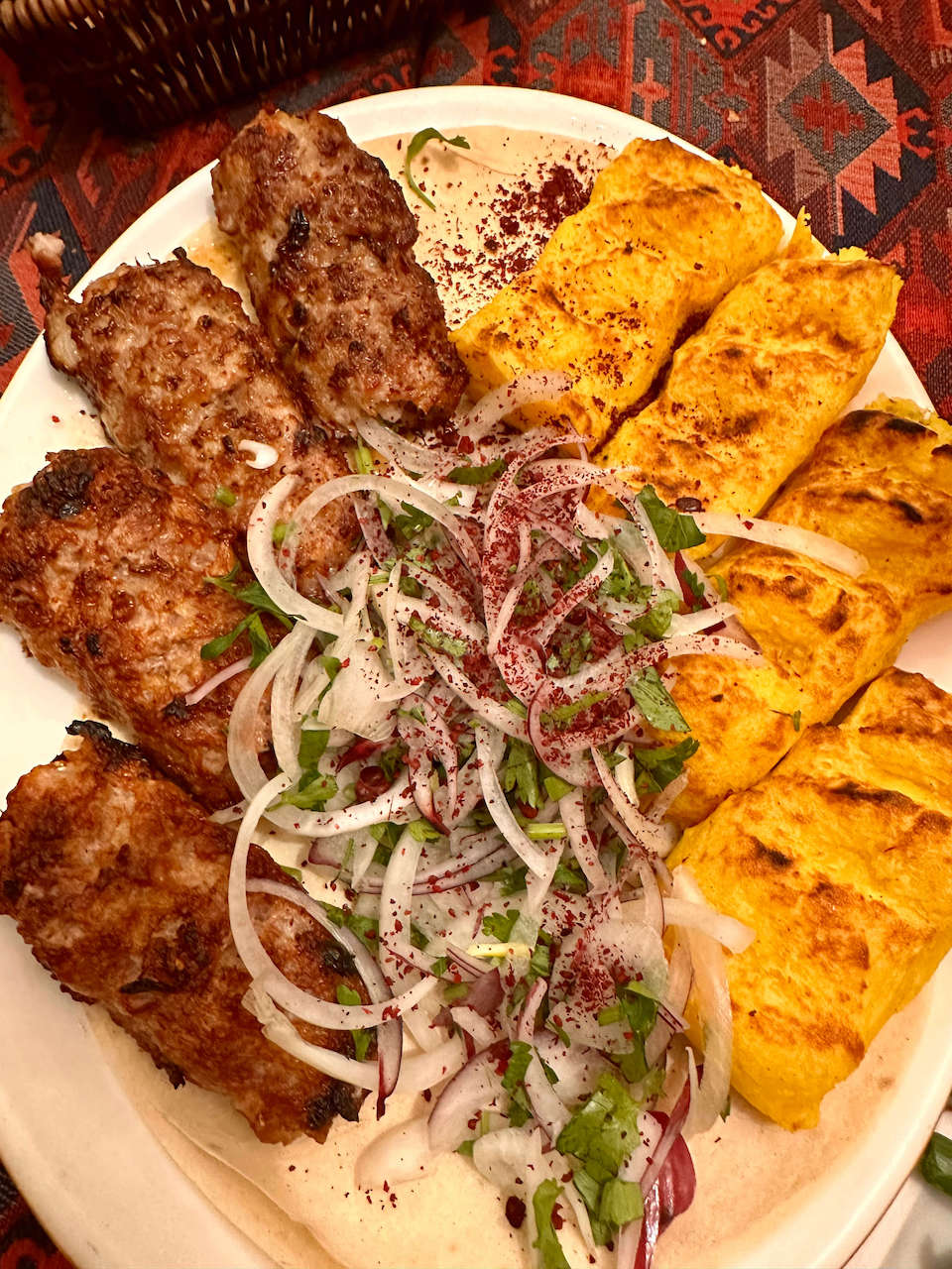 Azerbaijan, Baku - Lamb kebabs and potatoes