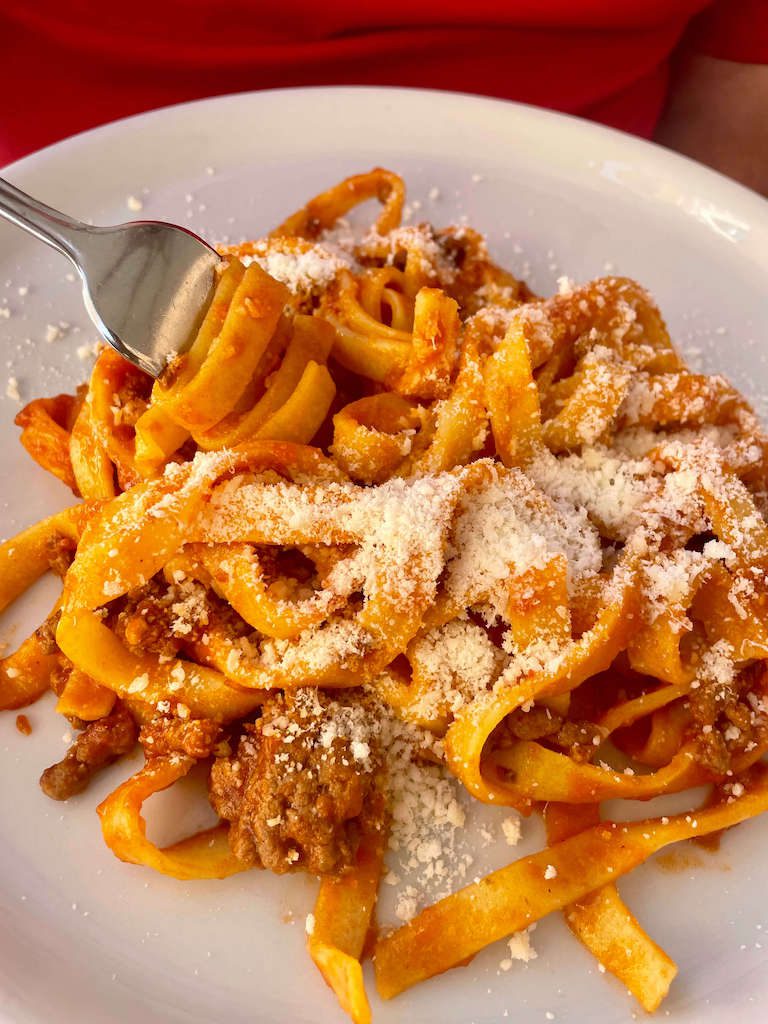 Italy, Rome - Pasta with meat sauce