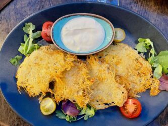 Latvia, Riga - Potato pancakes with sour cream