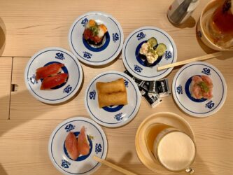 Japan, Tokyo - Sushi at Revolving Sushi Bar Kurasushi