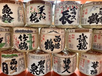 Japan, Miyajima - Sake barrels at Itsukushima Shrine