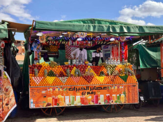 Morocco, Marrakech - Juice sellers at the Jemaa el-Fnaa square